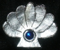 Pewter seashell token